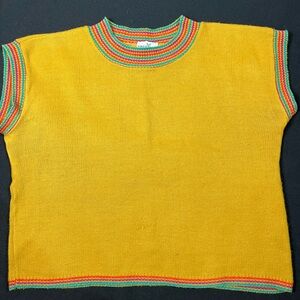 Colorful Yellow Sweater with Rainbow Accents